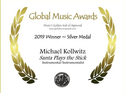 WINNER- Silver Medal for Santa Plays The Stick
