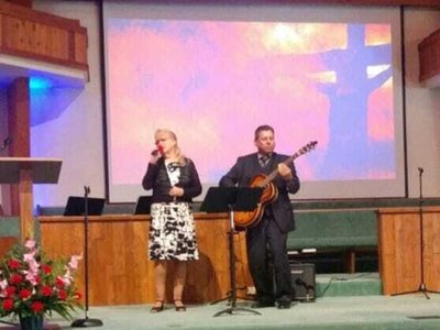 Messengers of the Cross singing Echoes of Grace in a Church.