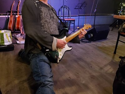 Here me doing the splits and playing guitar