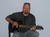 james and his acoustic guitar; picture taken by Annie Haslam