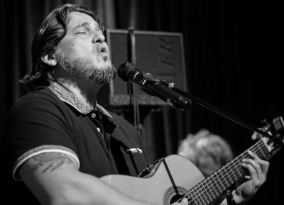Ricardo Ojeda on guitar and lead vocals