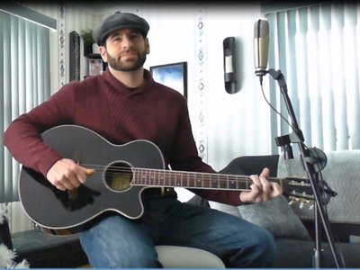Pic from cover song "Rainbow Connection"  which currently has 6k views on Youtube.