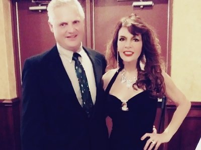 With my loving husband, after performing at a corporate Christmas party. 