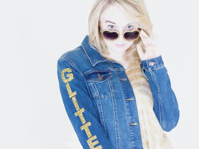 Ainsley Costello photo