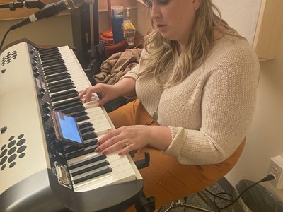 Christine hard at work learning covers for our live sets