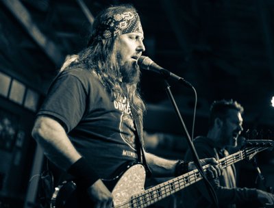Brian: Bass, Lead Vocals, BGV