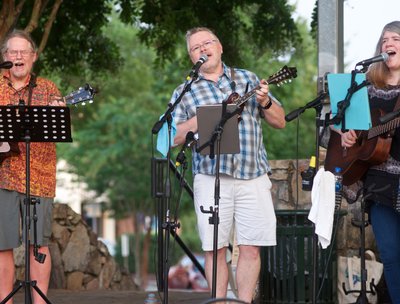 Jim Suiter with Nick Hutson and Susan Johnson hitting the harmonies