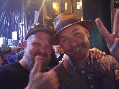 Nathan, the bassist for Flogging Molly, & I after one of their shows. Very cool guy! 
