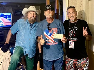 NDB-Artimus Pyle R&R Hall Of Fame Lynyrd Skynyrd Drummer/Ernie Wagoner/Myself Vet Jam Donation Check