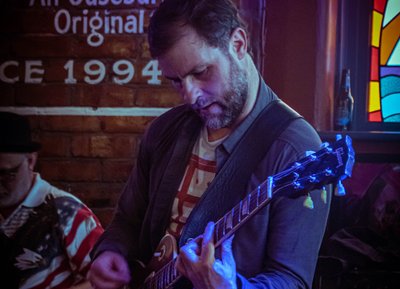 "like a tarantula on a fretboard"