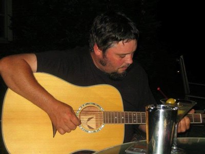 Chris Nickey and his Acoustic Guitar photo