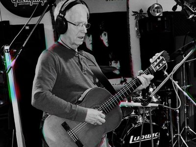 Elliot laying down guitar tracks for an upcoming Mission Road Album