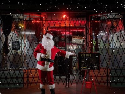 Screen snap from the music video for 'City Streets'. Yes, that is me playing Santa