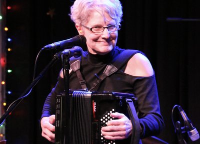 Sandee Washington - our front person and band leader.  She plays accordion, harp and sings!