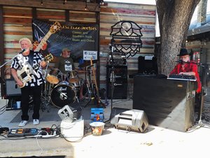 John on Guitar & Vocals, Tom on Drums, and Monty on Keys