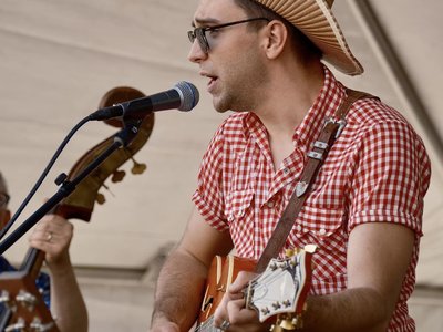 Brandon Wayne performs for the main stage crowd at Rockabillaque 2024.