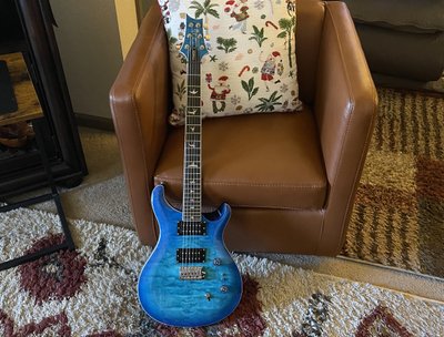 The best Christmas gift EVER!! My brand new Paul Reed Smith SE Custom 24-8 Quilt guitar in Lake Blue