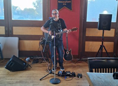 Chris Nickey and his Acoustic Guitar photo