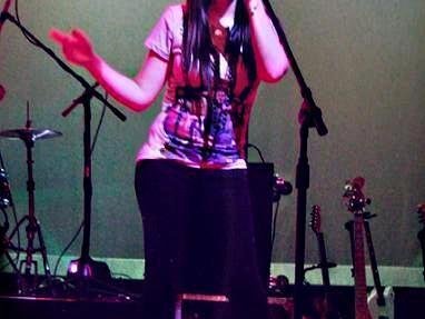 singing "Black horse and a cherry tree"