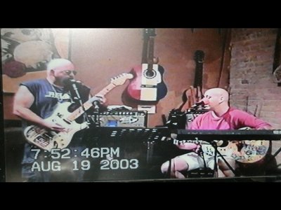 My friend Jason and I aka "The Gutter Monkeys" at the Neutral Ground Cafe, Waverly NY, 2003