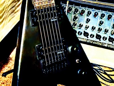 My new axe a Jackson king-V 7 string guitar. will be doing more original music from now on