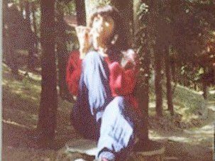 Playing mundharmonika in the woods