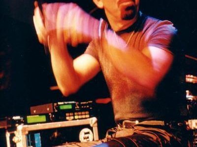 DICARLO DJing, and playing his E-Pads.