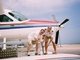 Me (on the left) pumping water out of a sea plane before flight