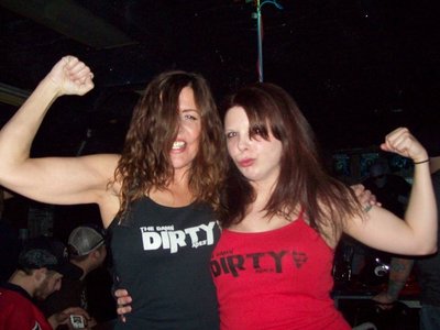 Ladies tanks ,Red and Black $10+shipping. size M thru XL. GET YOUR APE ON!!!!!