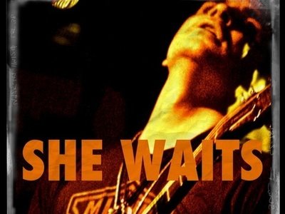 SHE WAITS