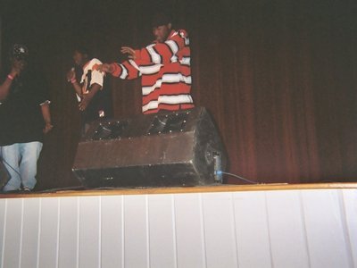The group performing on stage