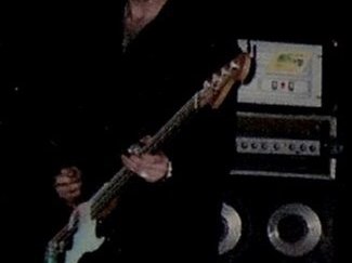 Bass.  Cool as f**k.  Canadian Music Week 2002 (ish).  The B-Side, Toronto.