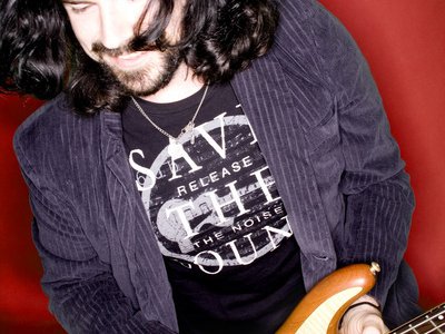 A.C. Rosby-bass guitar,backing vocals, the raddest hair on the planet