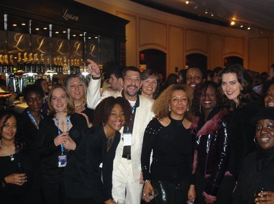 SS with members of The London Community Gospel Choir backstage at the RAH in 2004.