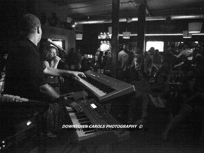 Singing with Shawn Brown. (Photo courtesy of Downtown Carol Photography).