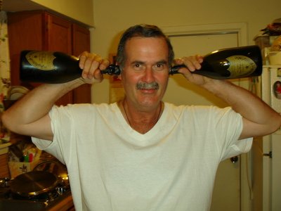 Jeff with 2 ears  full of Dom Perignon