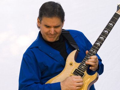 Michael Lewis with one of his custom guitars