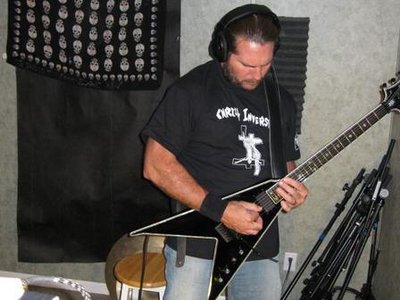 Scott recording guitar tracks for debut album