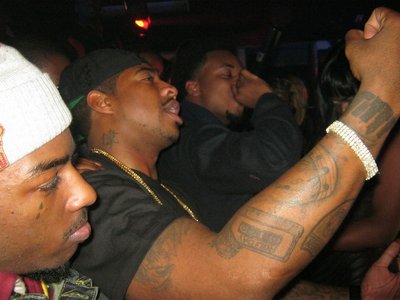 on stage with Travis porter,dj holiday at club glow 