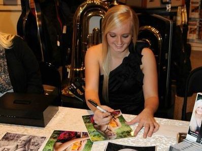Signing Autographs at CD Release Event