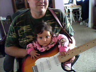 The youngest Guitar Hero at 8 months