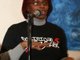 Me doing my poetry at Momentz of Noize Event in Brooklyn 12/13/08