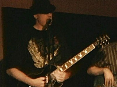 Chris PoppaFunk on guitar/vox