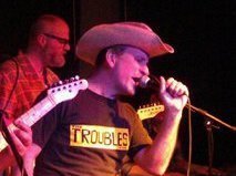 Traded in his baseball cap for a Cowboy hat... that's where he's at...