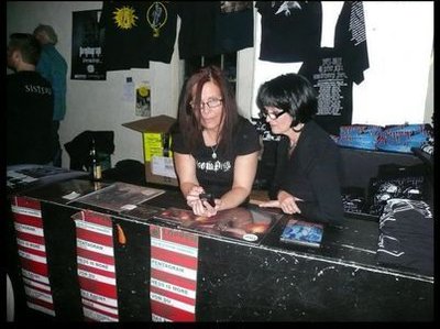Caroline De Haas Bjørneboe and Kim Stinnett Tomaselli selling Doomdogs and Pentagram merch