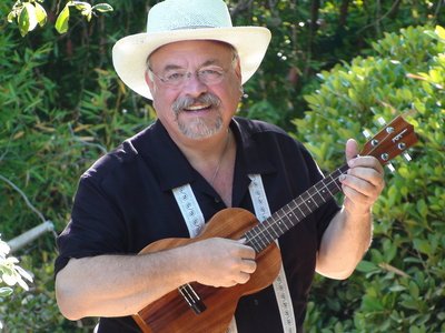 Ron plays tenor Ukulele