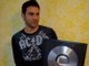 One of our producers Sean, with one of his platinum records!