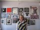Bernadette and her wall of accomplishments and past work!