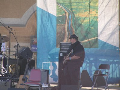 Bass player Tim Green of Brethren on the main stage of Helena