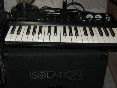 Line 6 KB37 Midi-inter face keyboard and mobile studio running podfarm modules and Reason sequencer.
